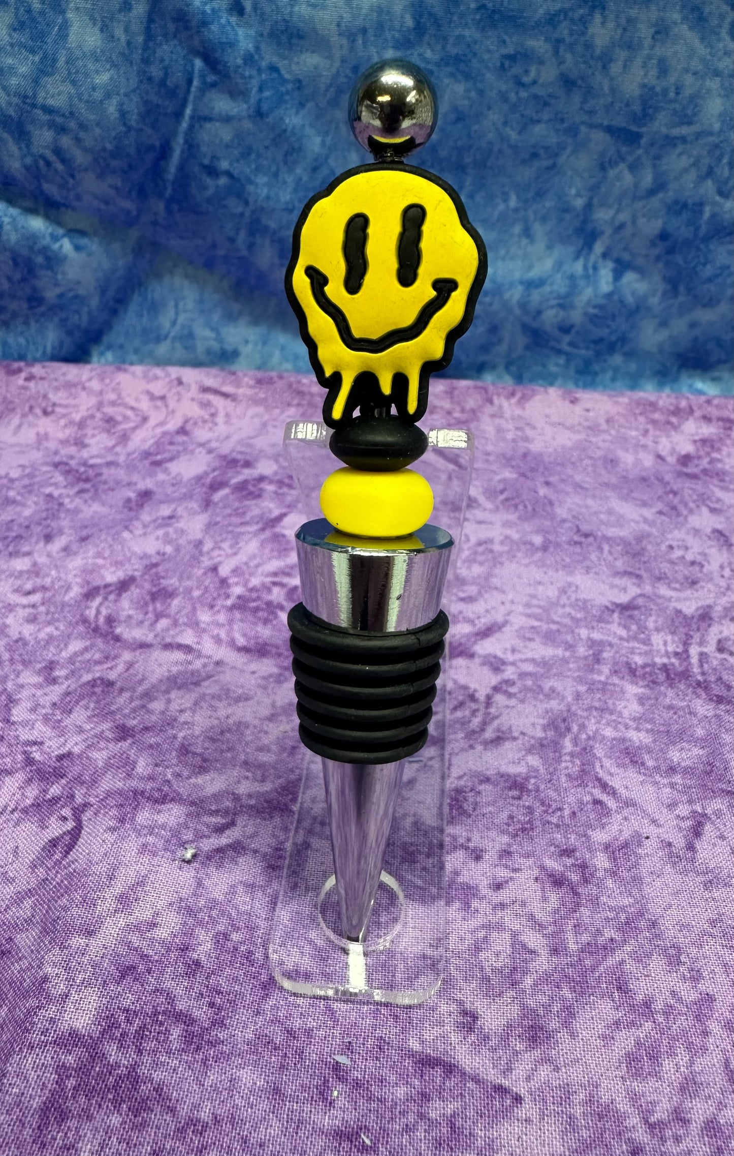 Melting smiley face  - wine stopper