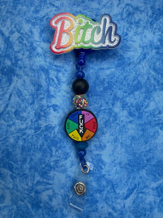 B*tch Spinning Wheel Game - Beaded Badge Reel